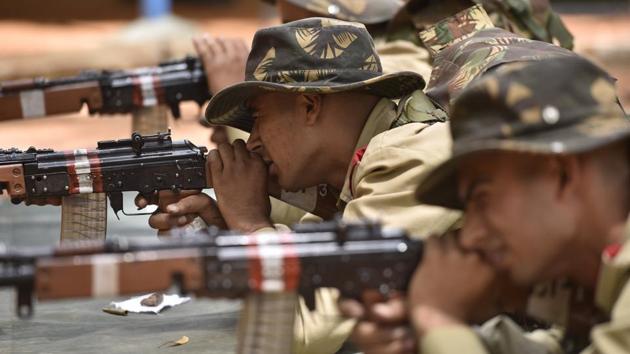 The rigorous training of these soldiers who live by the regimental motto of ‘Shatrujit’ or conqueror involves extensive short range warfare involving shooting, grenade handling and sniper training. Hand to hand combat, martial arts, infiltration practices and the eponymous parachute descent also go in to the making of an Indian paratrooper --a period that lasts 3.5 years for the special forces operators. (Arijit Sen / HT Photo)