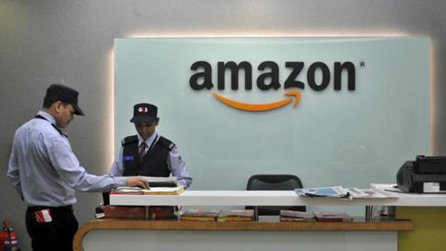 Security guards stand at the reception desk of the Amazon India office in Bengaluru, India, August 14, 2015. (REUTERS File Photo) Security guards stand at the reception desk of the Amazon India office in Bengaluru, India, August 14, 2015. (REUTERS File Photo)