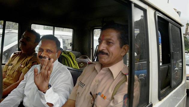 Lt. Col. Shrikant Prasad Purohit, who was granted bail by the Supreme Court yesterday in the 2008 Malegaon blast case, being taken to Session Court from Taloja Jail on Tuesday.(PTI Photo)