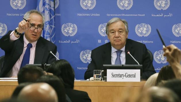 UN spokesman Stephane Dujarric, left, fields questions for UN Secretary-General António Guterres (right) during a press conference on June 20 at UN headquarters.(AP File Photo)