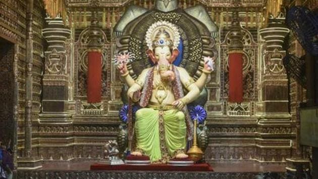 A visit to Lalbaugcha Raja is believed to fulfil all your wishes and attracts millions of visitors. (HT file photo) A visit to Lalbaugcha Raja is believed to fulfil all your wishes and attracts millions of visitors. (HT file photo)