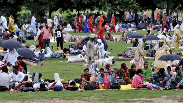 Dera supporters in gathered in Panchkula ahead of the verdict on August 25. (PTI Photo) Dera supporters in gathered in Panchkula ahead of the verdict on August 25. (PTI Photo)