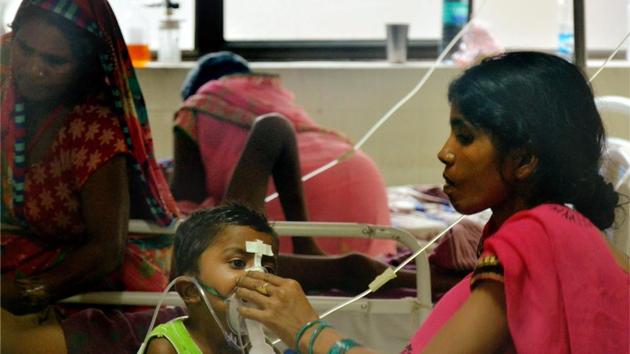 Children receive treatment in the encephalitis ward at BRD Medical College in Gorakhpur. (PTI Photo) Children receive treatment in the encephalitis ward at BRD Medical College in Gorakhpur. (PTI Photo)