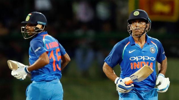 MS Dhoni and Bhuvneshwar Kumar run between wickets during the second ODI against Sri Lanka. Get full cricket score of India vs Sri Lanka here.(REUTERS) MS Dhoni and Bhuvneshwar Kumar run between wickets during the second ODI against Sri Lanka. Get full cricket score of India vs Sri Lanka here.(REUTERS)