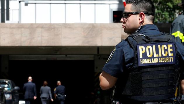 A Homeland Security officer stands in front of the parking garage of 26 Federal Plaza, in New York City, US, August 16, 2017. (REUTERS) A Homeland Security officer stands in front of the parking garage of 26 Federal Plaza, in New York City, US, August 16, 2017. (REUTERS)