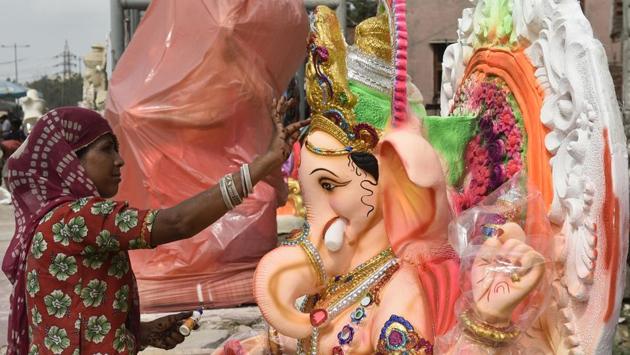 The festival is synonymous with the chants of ‘Ganpati Bappa Morya’ chanted by devotees in processions throughout the 10-day period, calling the deity back to their homes as soon as possible next year. Another icon of the festival is the rice flour based dumpling called Modak, considered a favourite of Ganesha, lending him the additional title of ‘Modakpriya’. (Burhaan Kinu / HT Photo)