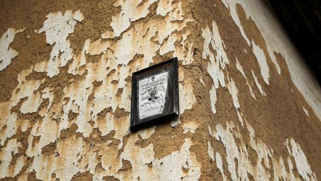 A death notice hangs on a wall of an abandoned house in the empty village of Repusnica, Serbia. The dwindling population has left many villages inhabitated only by elderly couples or in some cases a single person. Schools, clinics, veterinary stations and shops are closed while visitors are rare and roads peppered with potholes. (Marko Djurica / REUTERS)