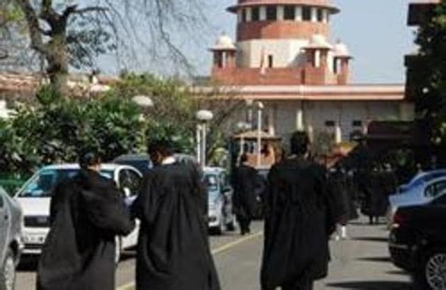 Lawyers outside the Supreme Court in New Delhi. (File) Lawyers outside the Supreme Court in New Delhi. (File)