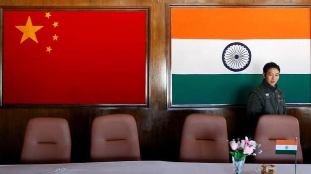 A man walks inside a conference room used for meetings between military commanders of China and India, in Arunachal Pradesh, November 11, 2009.(Reuters File Photo)