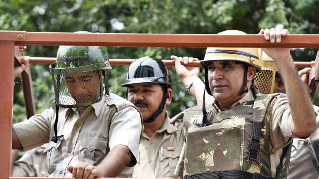 Police personnel were deployed to ensure that no untoward incident takes place. Dera chief Ram Rahim was convicted by a CBI court on Friday. (Sanjeev Verma/HT PHOTO) Police personnel were deployed to ensure that no untoward incident takes place. Dera chief Ram Rahim was convicted by a CBI court on Friday. (Sanjeev Verma/HT PHOTO)