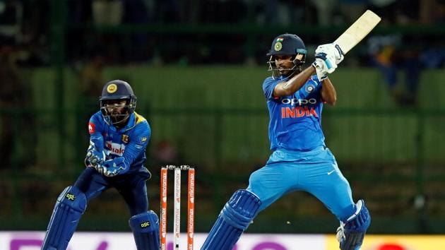 Bhuvneshwar Kumnar (R) aided Dhoni well and scored a calculated fifty to help take the side home. (REUTERS)
