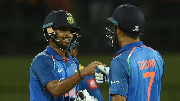 India defeated Sri Lanka by three wickets as a superb partnership between Bhuvneshwar Kumar (L) and MS Dhoni saw the side bounce back from a mid-innings collapse. (AFP)