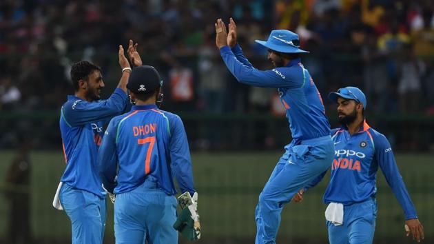 Axar Patel (L) picked just one wicket, but kept an economy rate of 3 per over. (AFP)