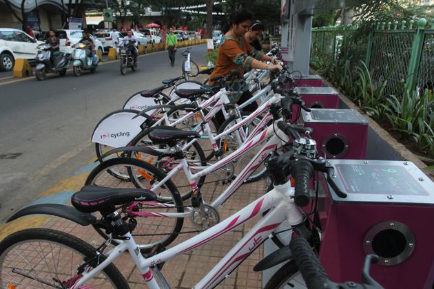 People check out bikes at the newly-inaugurated cycle stand near Viviana Amll on Thursday.(Praful Gangurde)