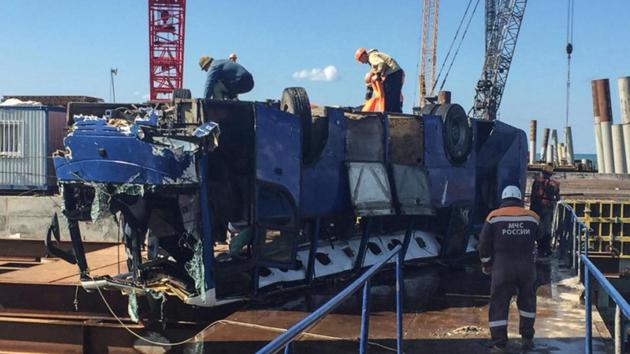 A handout picture released by Russia's Emergency Ministry shows rescuers working on a wreckage, on August 25, 2017 after a bus carrying construction workers, veered off a pier and plunged into the Black Sea, in Krasnodar region. (AFP) A handout picture released by Russia's Emergency Ministry shows rescuers working on a wreckage, on August 25, 2017 after a bus carrying construction workers, veered off a pier and plunged into the Black Sea, in Krasnodar region. (AFP)