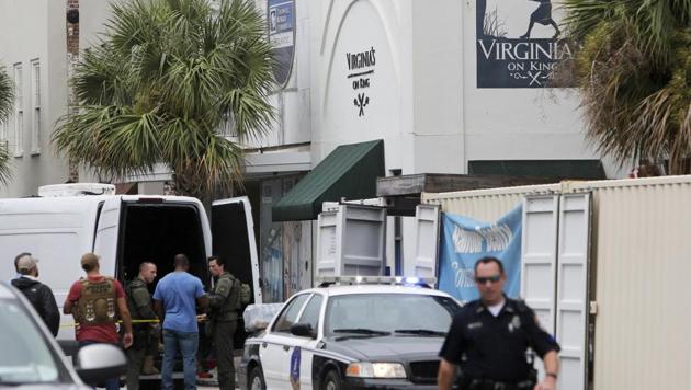 Police department officers block access to King Street in front of the restaurant Virginia's in Charleston, South California on August 24. (AP Photo) Police department officers block access to King Street in front of the restaurant Virginia's in Charleston, South California on August 24. (AP Photo)
