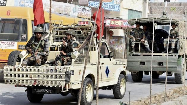 Army personnel patrol a road near Dera Sacha Sauda’s Sirsa headquarters on Saturday. (PTI) Army personnel patrol a road near Dera Sacha Sauda’s Sirsa headquarters on Saturday. (PTI)