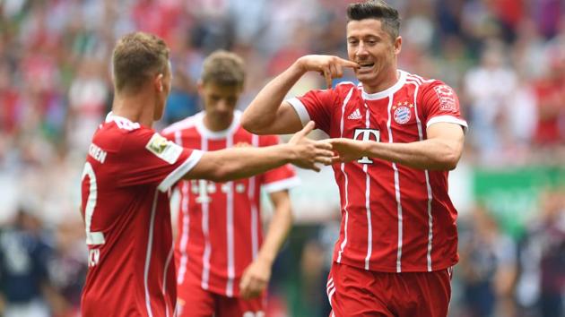 Bayern Munich striker Robert Lewandowski celebrates after scoring against Werder Bremen. (AFP) Bayern Munich striker Robert Lewandowski celebrates after scoring against Werder Bremen. (AFP)