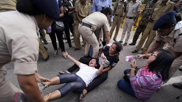 Police detain Gorkha people who were staging a protest for separate state of Gorkhaland, at Rajpath near Parliament house in New Delhi on Friday. (PTI File Photo) Police detain Gorkha people who were staging a protest for separate state of Gorkhaland, at Rajpath near Parliament house in New Delhi on Friday. (PTI File Photo)