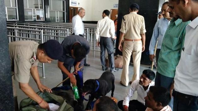 Police frisk passengers at Haridwar railway station following order by the state government to take preventive measures. (HT Photo) Police frisk passengers at Haridwar railway station following order by the state government to take preventive measures. (HT Photo)