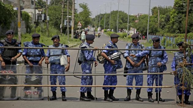 With almost 200,000 ‘premis’ making their way to Panchkula by August 25, Army and Rapid Action Force personnel barricaded roads leading to the special CBI court in Panchkula, forming a preventive measure. With mobile data services suspended, schools, colleges and government offices in Panchkula were also shut in the lead up to the verdict creating a lockdown situation. (Altaf Qadri / AP)