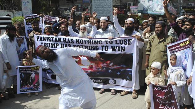 A Pakistani protester shouts slogans against the US during a rally in Hyderabad, Sindh province, on August 25, 2017. Pakistan's political and military leaders have rejected President Donald Trump's allegation that Islamabad is harbouring militants who battle US forces in Afghanistan. (AP) A Pakistani protester shouts slogans against the US during a rally in Hyderabad, Sindh province, on August 25, 2017. Pakistan's political and military leaders have rejected President Donald Trump's allegation that Islamabad is harbouring militants who battle US forces in Afghanistan. (AP)