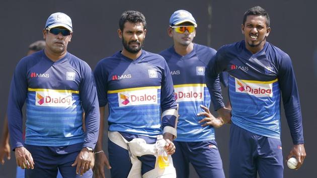 Chaminda Vaas oversees bowling preparations along with Vishwa Fernando. (AP) 