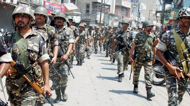 Army soldiers conduct a flag march amid a curfew after their deployment in Jalandhar.(PTI File Photo)