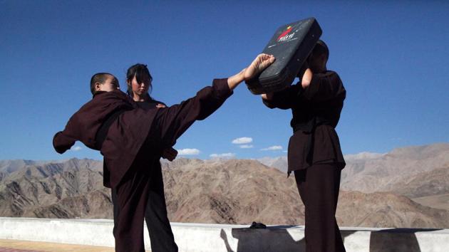 Buddhist nuns help a participant learn Kung Fu, a form of martial art, during a five-day workshop in Hemis region in Ladakh. (Nita Bhalla REUTERS) 