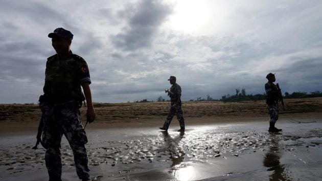 Myanmar border guard police officers in Buthidaung, northern Rakhine state, Myanmar.(Reuters)