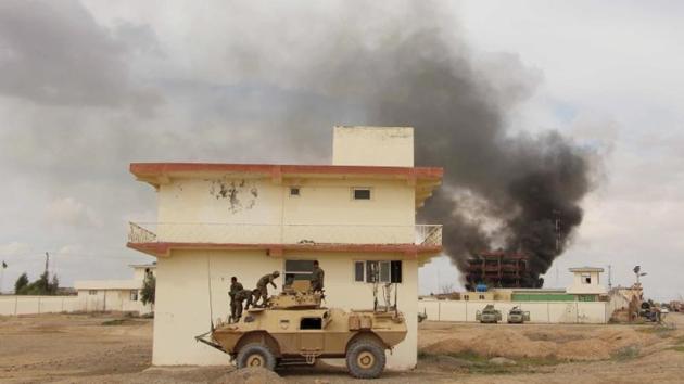 Smoke billows from a building after a Taliban attack in Gereshk district of Helmand province in Afghanistan. (File for representation) Smoke billows from a building after a Taliban attack in Gereshk district of Helmand province in Afghanistan. (File for representation)