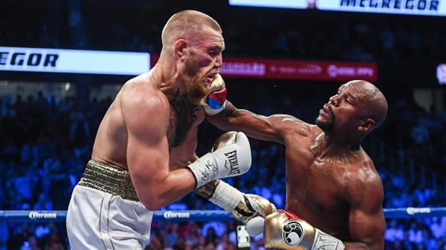 It all changed in the fourth round when Mayweather (R) started dominating proceedings. (Sportsfile via Getty Images) It all changed in the fourth round when Mayweather (R) started dominating proceedings. (Sportsfile via Getty Images)