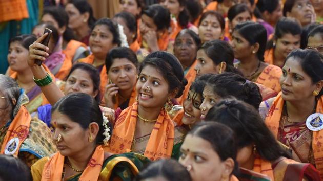 A woman takes a selfie at during the Ganesh Festival in Dagdusheth Halwai for Ganeshotsav, Pune on Saturday. (Pratham Gokhale/HT PHOTO)