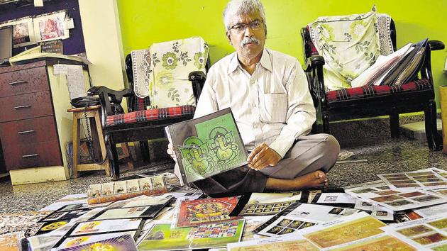 Vinayak Awate, philatelist and numismatist who has hundreds of stamps, stamp papers from countries having faith in Lord Ganesha.(Ravindra Joshi/HT PHOTO)