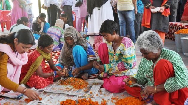 Women attend a training programme at Nari Niketan for using flowers for making incense sticks in Dehradun. (HT File Photo) Women attend a training programme at Nari Niketan for using flowers for making incense sticks in Dehradun. (HT File Photo)