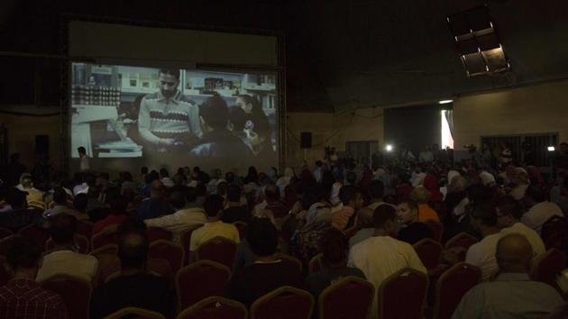 Palestinians attend the screening of 10 Years at Samer Cinema in Gaza City on August 26. (AFP) Palestinians attend the screening of 10 Years at Samer Cinema in Gaza City on August 26. (AFP)