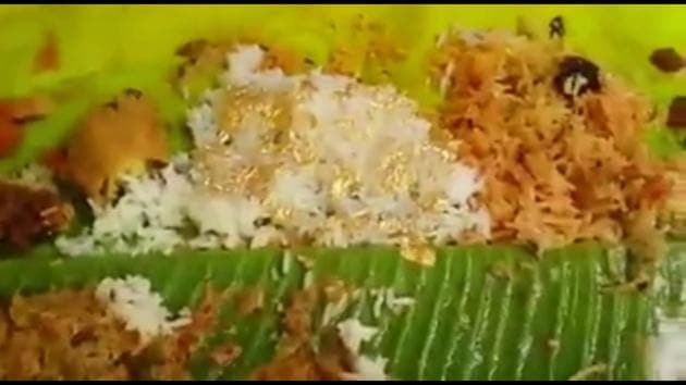 A video that is going viral on WhatsApp, shows guests eating rice covered with gold leaves (yes, made of 24 carat gold!) at a wedding. (YouTube) A video that is going viral on WhatsApp, shows guests eating rice covered with gold leaves (yes, made of 24 carat gold!) at a wedding. (YouTube)