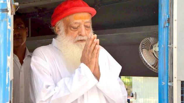 Asaram Bapu greets his supporters as he arrives for a hearing at a court in Jodhpur in this undated photo.(Ramji Vyas/ HT file photo) Asaram Bapu greets his supporters as he arrives for a hearing at a court in Jodhpur in this undated photo.(Ramji Vyas/ HT file photo)