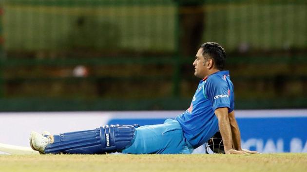 MS Dhoni ended up taking a power nap when fans forced play to stop at Pallekele. (REUTERS) MS Dhoni ended up taking a power nap when fans forced play to stop at Pallekele. (REUTERS)