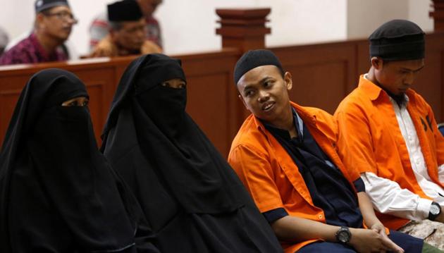 Dian Yulia Novi (2nd L), arrested last year on suspicion of plotting to blow herself up outside the presidential palace in Jakarta during a changing of the guard ceremony, stands trial along with her husband Muhammad Nur Solihin (2nd R) and co-defendants Ika Puspita Sari (L), Agus Supriyadi (R) in a court in Jakarta, Indonesia June 21, 2017. (Reuters) Dian Yulia Novi (2nd L), arrested last year on suspicion of plotting to blow herself up outside the presidential palace in Jakarta during a changing of the guard ceremony, stands trial along with her husband Muhammad Nur Solihin (2nd R) and co-defendants Ika Puspita Sari (L), Agus Supriyadi (R) in a court in Jakarta, Indonesia June 21, 2017. (Reuters)