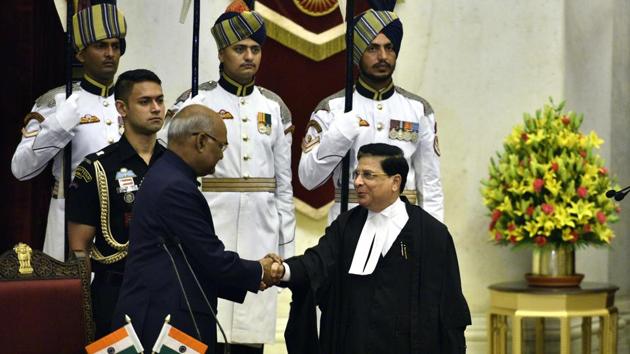 President Ram Nath Kovind congratulates Justice Dipak Misra as he takes oath as the 45th Chief Justice of India in New Delhi, India. (Arun Sharma/HT PHOTO) President Ram Nath Kovind congratulates Justice Dipak Misra as he takes oath as the 45th Chief Justice of India in New Delhi, India. (Arun Sharma/HT PHOTO)