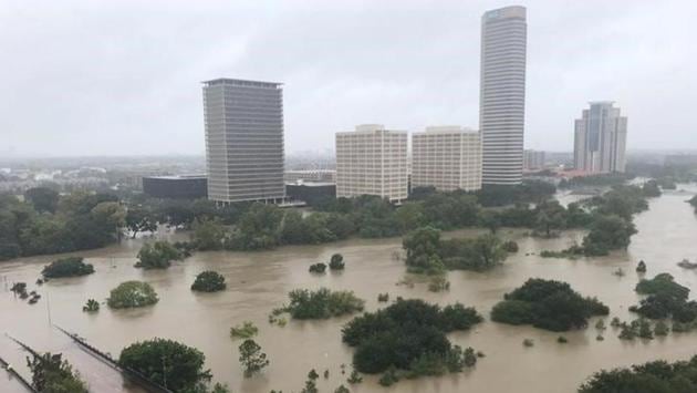 Torrential rain from Harvey hit areas more than 150 miles (240 km) away, swelling rivers upstream and causing a surge that was heading toward the Houston area. (Twitter/@caroleenarn via REUTERS ) Torrential rain from Harvey hit areas more than 150 miles (240 km) away, swelling rivers upstream and causing a surge that was heading toward the Houston area. (Twitter/@caroleenarn via REUTERS )