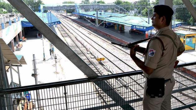 A paramilitary force personnel stands guard at the deserted Rohtak train station. Similar sights of deserted stations have also been seen in Haryana’s Karnal ahead of today’s sentencing due around 2:30 p.m. (PTI)