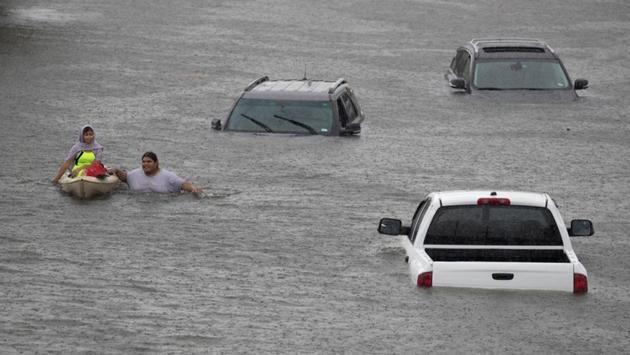 Flood damage in Texas from Hurricane Harvey may equal that from 2005’s Hurricane Katrina, the costliest natural disaster in U S. history. Having dumped more than two feet (60 cm) of water on Houston already, Harvey, which hit the Texas coast as a Category 4 hurricane but is now a tropical storm, was expected to hover over Southeast Texas for several days. Harvey came ashore late on Friday as the most powerful hurricane to hit Texas in more than 50 years and has killed at least three people. U.S. President Donald Trump plans to go to Texas on Tuesday to survey the damage and may also visit Louisiana, where the storm is now dumping rain. (Adrees Latif/ REUTERS) Flood damage in Texas from Hurricane Harvey may equal that from 2005’s Hurricane Katrina, the costliest natural disaster in U S. history. Having dumped more than two feet (60 cm) of water on Houston already, Harvey, which hit the Texas coast as a Category 4 hurricane but is now a tropical storm, was expected to hover over Southeast Texas for several days. Harvey came ashore late on Friday as the most powerful hurricane to hit Texas in more than 50 years and has killed at least three people. U.S. President Donald Trump plans to go to Texas on Tuesday to survey the damage and may also visit Louisiana, where the storm is now dumping rain. (Adrees Latif/ REUTERS)