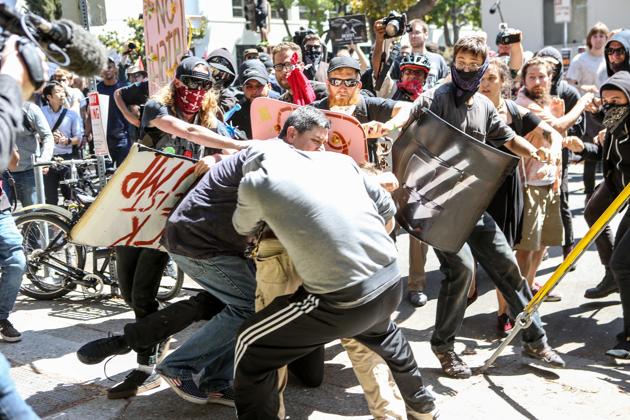 No-To-Marxism rally members and counter protesters clash on August 27, 2017 at Martin Luther King Park Jr. Civic Center Park in Berkeley, California. (AFP Photo) No-To-Marxism rally members and counter protesters clash on August 27, 2017 at Martin Luther King Park Jr. Civic Center Park in Berkeley, California. (AFP Photo)