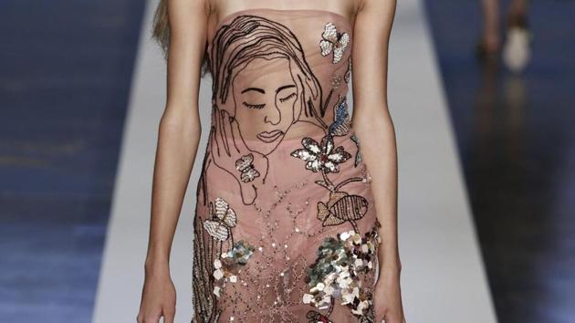 A model presents a creation during the Sao Paulo Fashion Week in Sao Paulo, Brazil on August 28, 2017. (AFP)