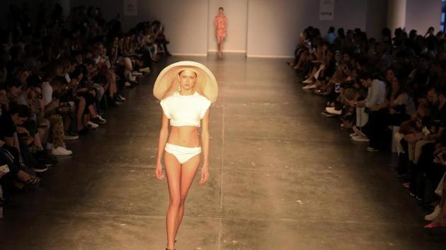 A model presents a creation during the Sao Paulo Fashion Week in Sao Paulo, Brazil on August 28, 2017. (AFP)