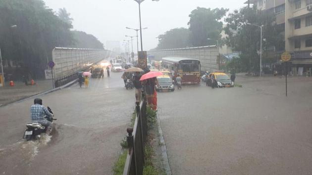 Heavy and incessant rains over Monday night and Tuesday morning have severely affected the city’s life line, the suburban railway services.(Bhushan Koyande.)