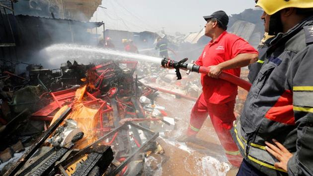 The explosion damaged several stalls at the market and gutted shops in the adjoining shopping centre with debris, glass and vegetables strewn across the ground. (Wissm al-Okili / REUTERS)