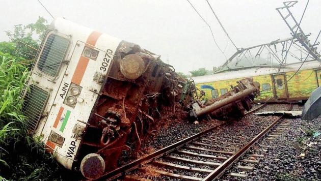 Derailed engine and coaches of Nagpur-Mumbai Duronto Express train near Asangaon in Maharashtra's Thane district on Tuesday morning. No casualties or injuries were reported, officials said.(PTI Photo)